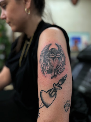 Explore tattoo ideas doves, creative tattoo ideas in Astoria, available at Xolotl Tattoo Gallery