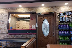 Al-Qamar Pizza & Subs image