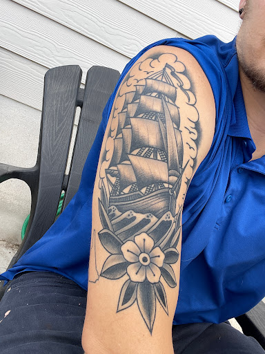 Explore watercolor flower tattoo ideas, creative tattoo ideas in Georgetown, available at Iron Rite Tattoo South