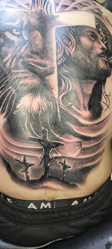 Explore lover tattoo ideas, creative tattoo ideas in Angola, available at Hoodlum Ink