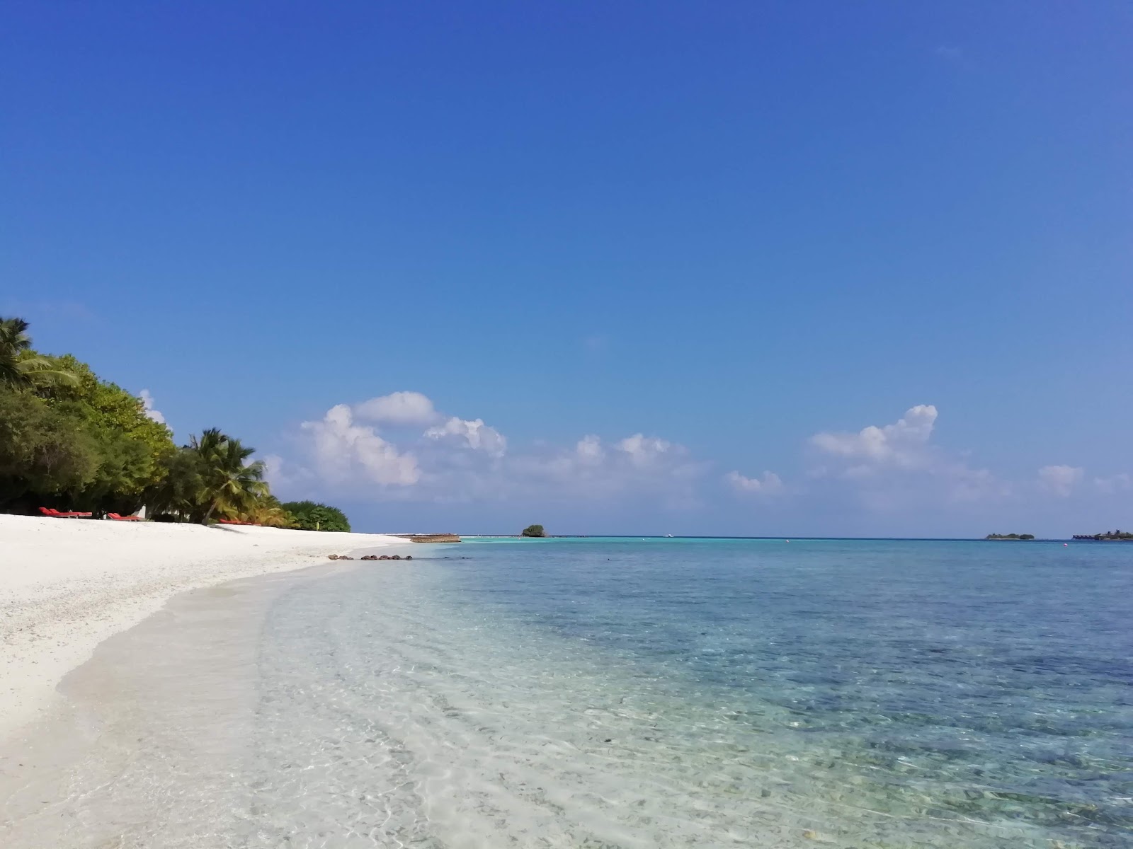 Fotografie cu Club Med Kani island cu o suprafață de nisip alb