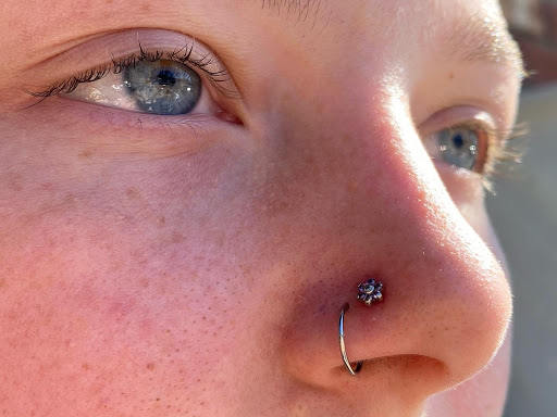 Explore kayak tattoo ideas, creative tattoo ideas in Providence, available at Kissed by a Needle