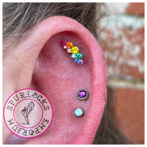 Explore cover up tattoo ideas female leg, creative tattoo ideas in Muskogee, available at Spurlocks Emporium