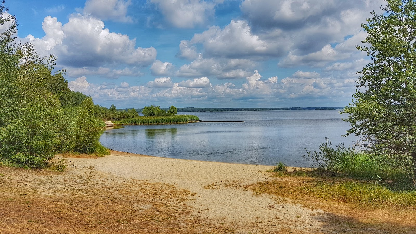 Valokuva Quitzdorf am Seeista. pinnalla kirkas hiekka:n kanssa