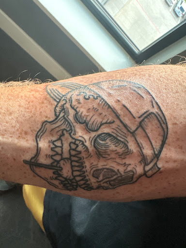 Explore ferret tattoo ideas, creative tattoo ideas in Mckinney, available at Boss Frog Tattoos