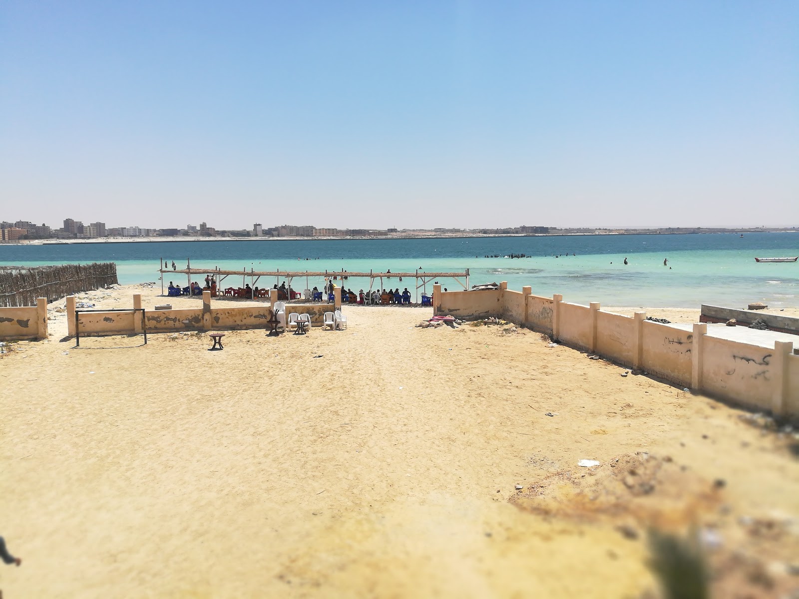 Fotografija Si Omar Resort Beach z svetel pesek površino