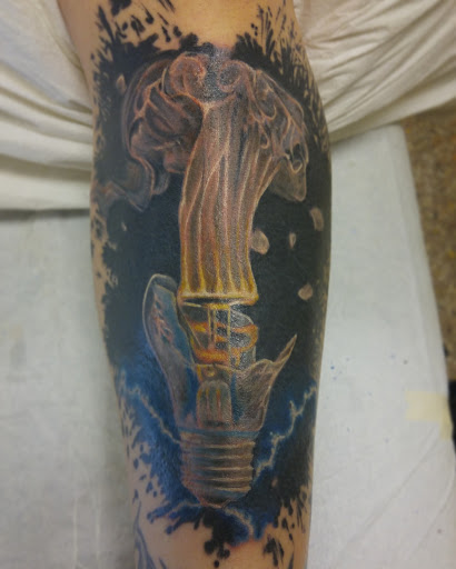 Explore wife tattoo ideas for husband, creative tattoo ideas in Cleveland, available at Stranci Tattoo & Piercing Co.