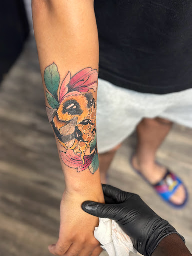 Explore tricep tattoo ideas for men, creative tattoo ideas in Goose Creek, available at Red Kirin Tattoo