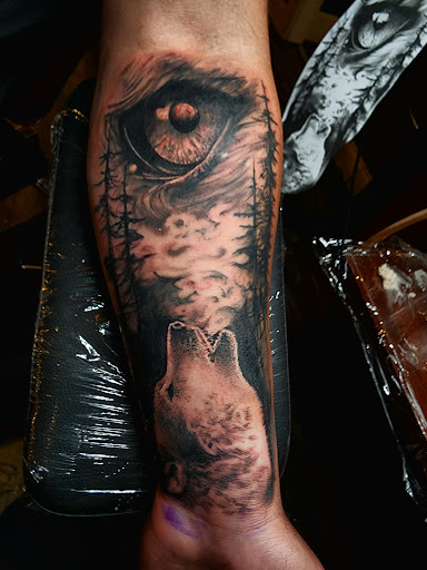 Explore chandelier tattoo ideas, creative tattoo ideas in Fuquay Varina, available at 401 Tattoo and Antiquities