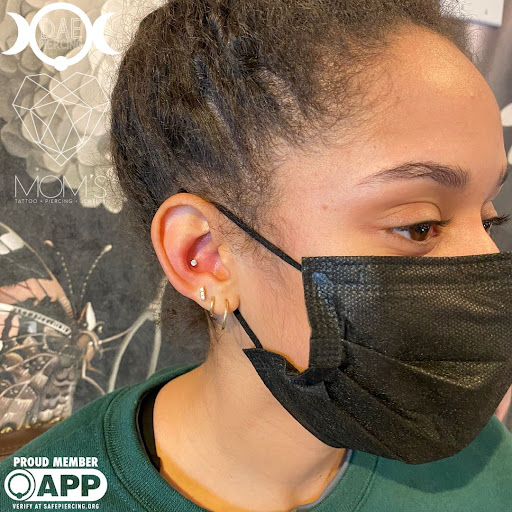 Find finger tattoo ideas for men for your next unique tattoo in Spokane at Moms Custom Tattoo & Body Piercing