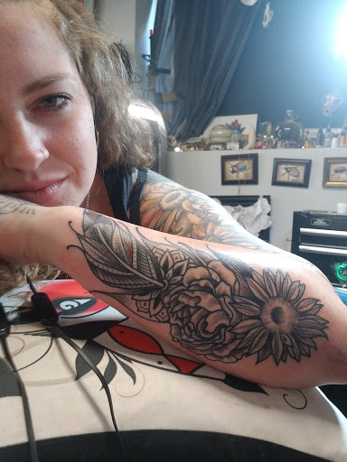 Explore forearm sleeve tattoo ideas for females, creative tattoo ideas in Colorado Springs, available at Fallen Heroes Tattoo & Piercing (Colorado)