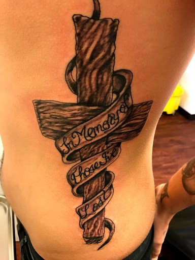 Explore star tattoo cover up ideas, creative tattoo ideas in Seymour, available at American Gypsy Tattoo Corp.