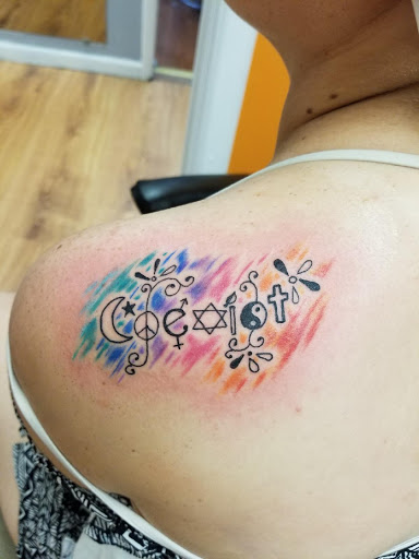 Explore tattoo ideas peace, creative tattoo ideas in Warren, available at Elite Ink Tattoo Studios