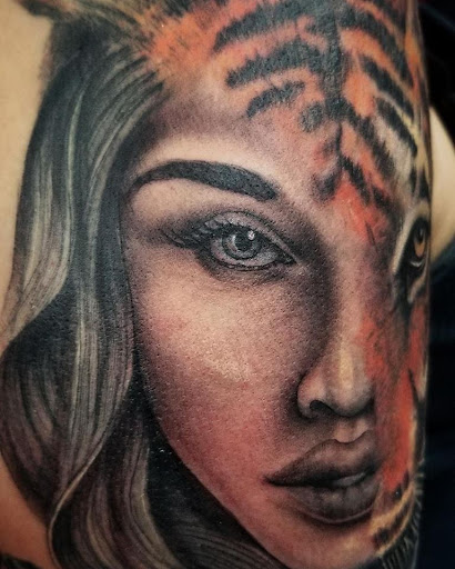 Explore tattoo ideas behind the ear tattoos, creative tattoo ideas in Anchorage, available at SDITATTOO, LLC