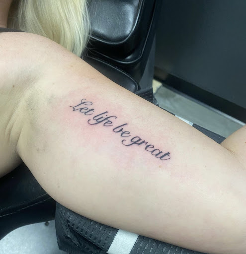 Explore name cover up tattoo ideas for men, creative tattoo ideas in Peoria, available at Modern Ink Tattoo