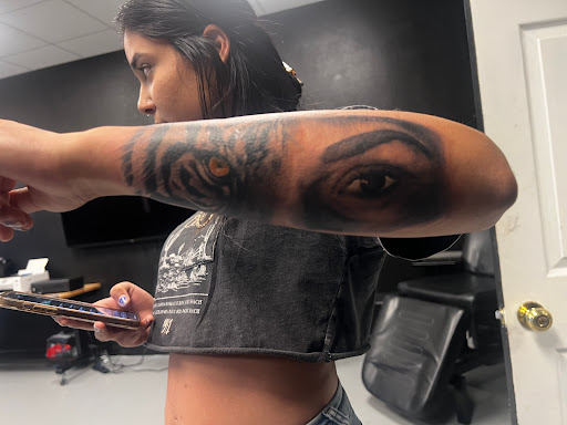 Find tattoo ideas under breast for your next unique tattoo in Gulfport at Phantom Art Studio