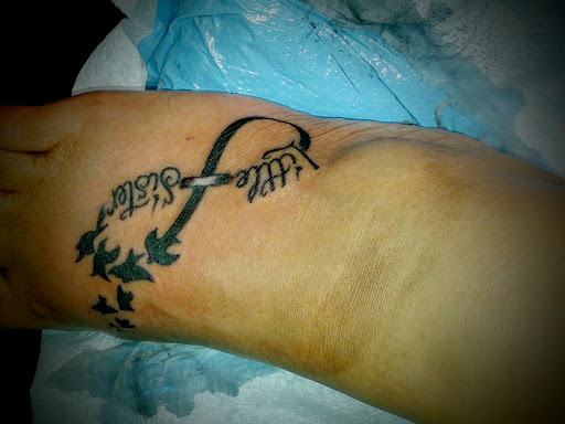 Tattoo Shop «LONE WOLF TATTOO», reviews and photos, 211 Bedford Ave, Bellmore, NY 11710, USA