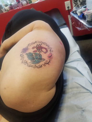 Explore rolling stones tattoo ideas, creative tattoo ideas in Reno, available at My Religion Tattoo - No Piercing