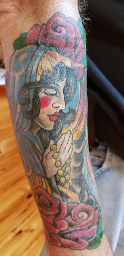 Explore male hand tattoo ideas, creative tattoo ideas in Eureka Springs, available at Sailors Luck Tattoo