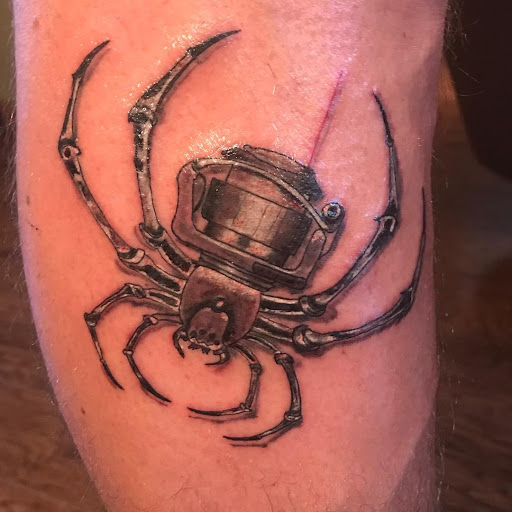 Explore saint tattoo ideas, creative tattoo ideas in Vermillion, available at IKTOMI-INK Tattoo Experience