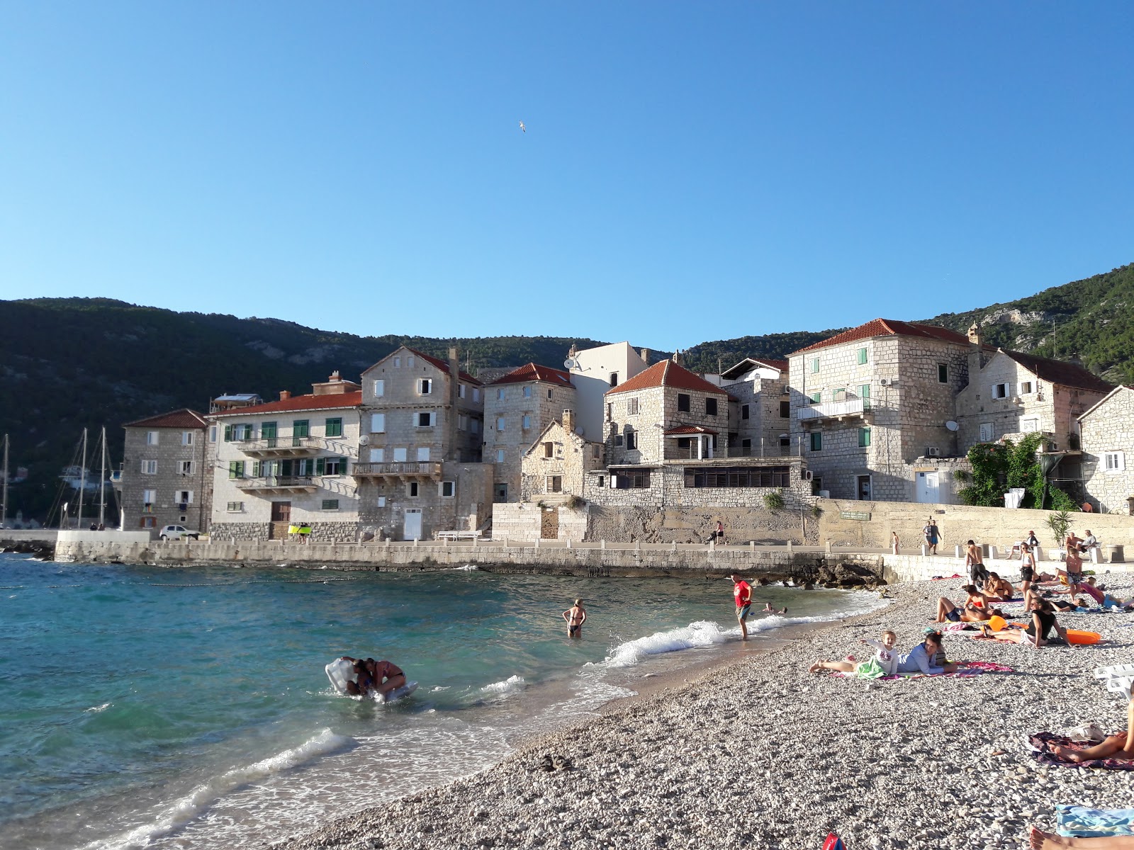 Photo de Lucica beach avec l'eau cristalline de surface