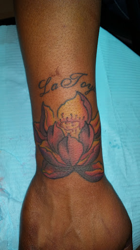 Explore just keep swimming tattoo ideas, creative tattoo ideas in Foley, available at Black Sheep Custom Tattoos and Piercings