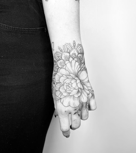Explore tattoo ideas for men hand, creative tattoo ideas in Hannibal, available at Hawthorn by ButterBee