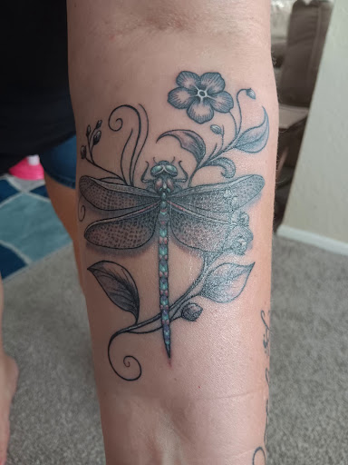 Explore female wrist tattoo ideas, creative tattoo ideas in Sarasota, available at SEVEN SINS Tattoo Studio