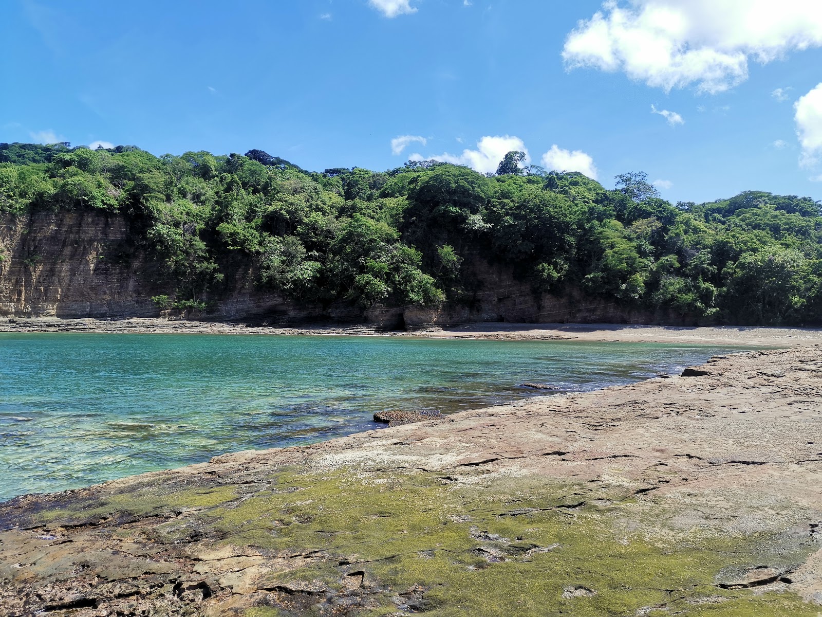Foto van Punta Julian beach met turquoise puur water oppervlakte