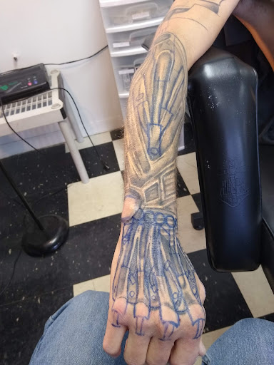 Explore mens infinity tattoo ideas, creative tattoo ideas in Owosso, available at Twisted ink tattoo