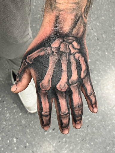 Find lesbian tattoo ideas for your next unique tattoo in La Vista at InkedUp Needles