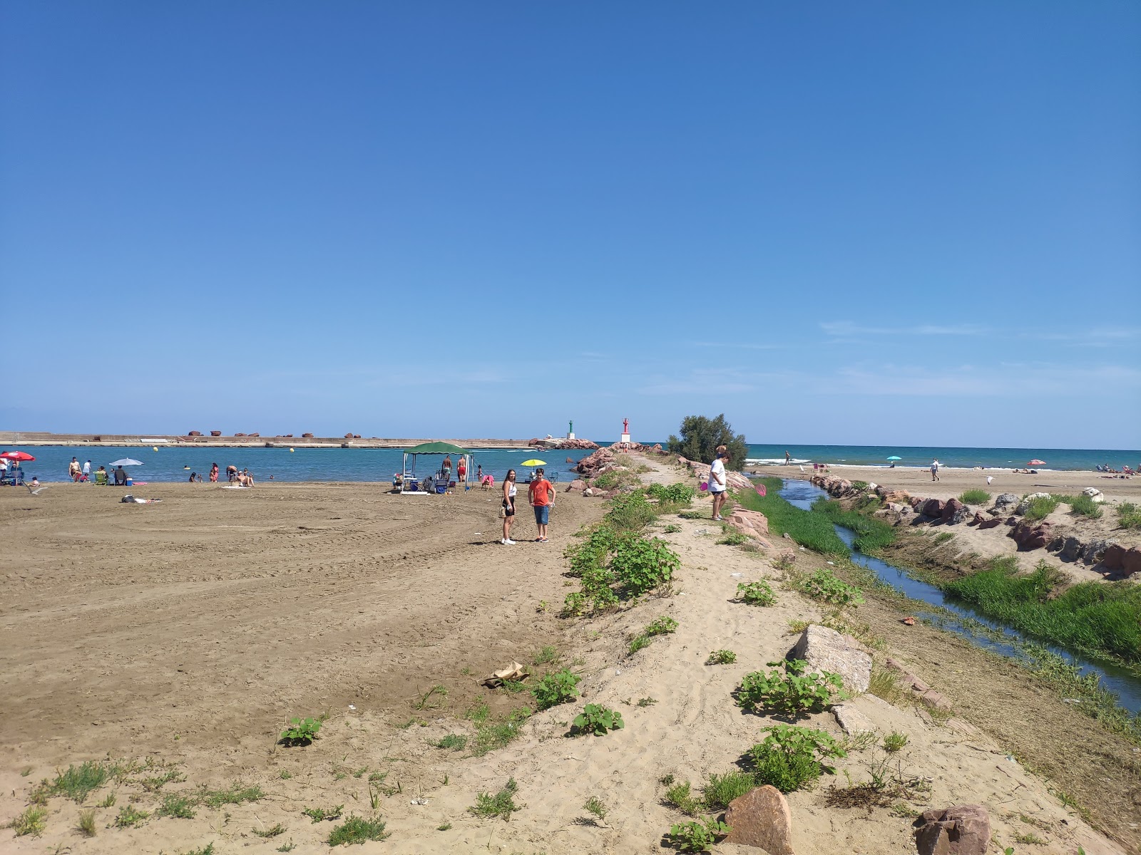 Playa Pobla Marina'in fotoğrafı küçük koy ile birlikte