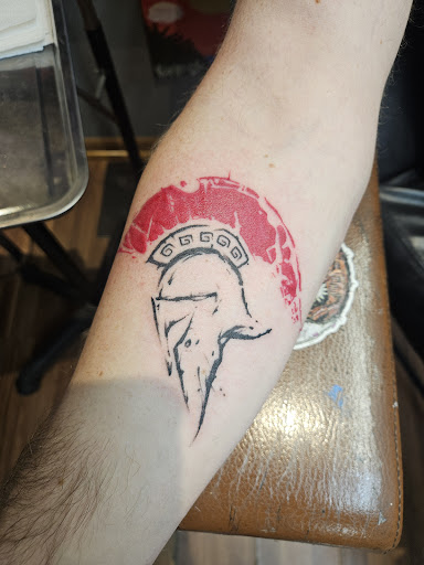 Explore spartan warrior tattoo ideas, creative tattoo ideas in Rockford, available at Reigning Ink Tattoo Emporium