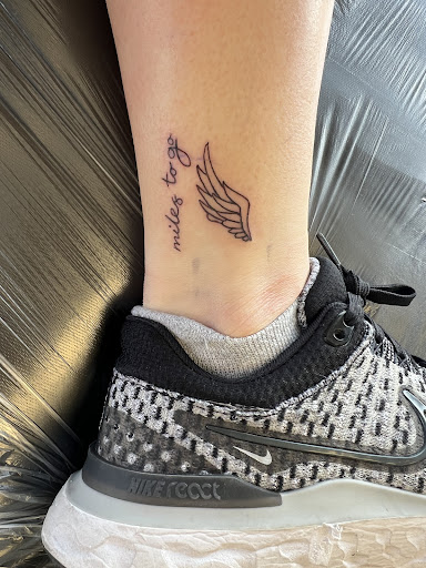 Explore bite me tattoo ideas, creative tattoo ideas in Osage Beach, available at Lake Ozark Tattoo and Hair Studio