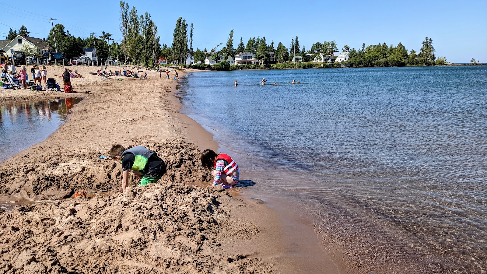Foto von Eagle Harbor Beach mit beiger sand Oberfläche