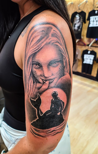 Explore cute bee tattoo ideas, creative tattoo ideas in Palm Coast, available at Devoted Tattoo Studio