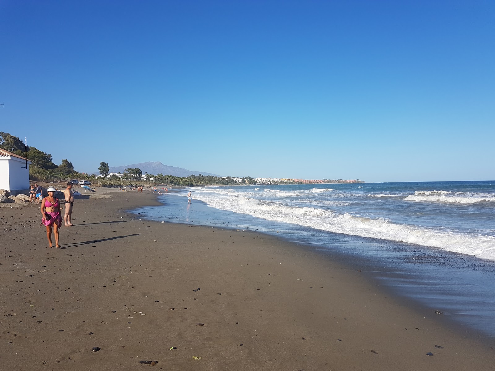 Foto von Playa del Velerin mit teilweise sauber Sauberkeitsgrad