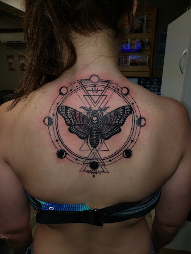 Explore skier tattoo ideas, creative tattoo ideas in Linn Creek, available at Hillard Skillard Tattoos, LLC.