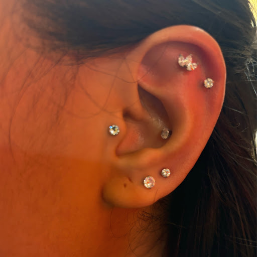 Explore lily tattoo ideas, creative tattoo ideas in San Diego, available at Body Art Salon