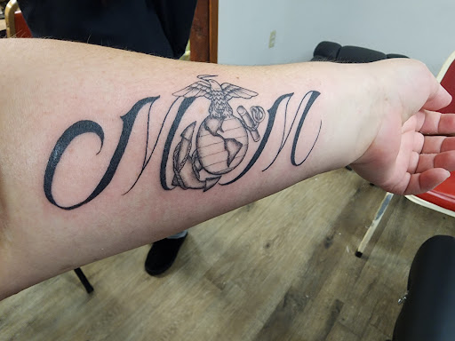 Explore snowboarding tattoo ideas, creative tattoo ideas in Fresno, available at Island Ink Tattoo