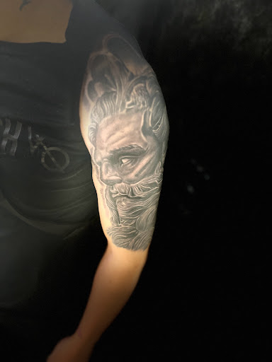 Explore lighthouse tattoo ideas, creative tattoo ideas in Sarasota, available at SEVEN SINS Tattoo Studio