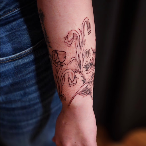 Explore skydive tattoo ideas, creative tattoo ideas in Minocqua, available at Whisky Rose Tattoo Parlor