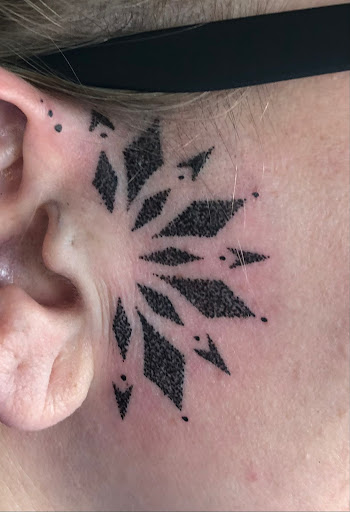 Explore face tattoo ideas, creative tattoo ideas in North Tonawanda, available at Dark Side Ink Tattoo Studio