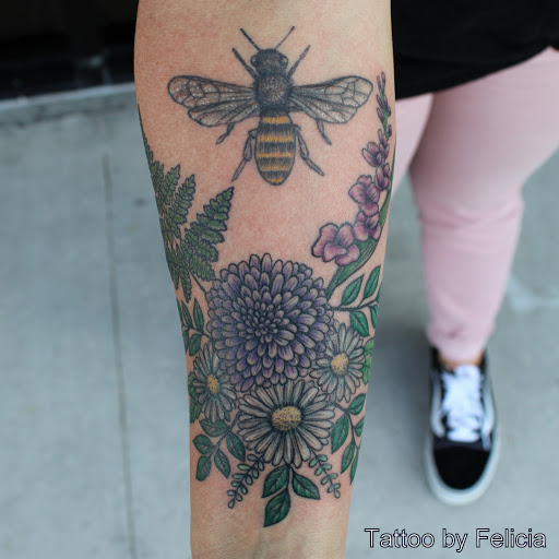 Explore aztec sleeve tattoo ideas for men, creative tattoo ideas in Fort Myers, available at Tiger Lotus Tattoo and Piercing