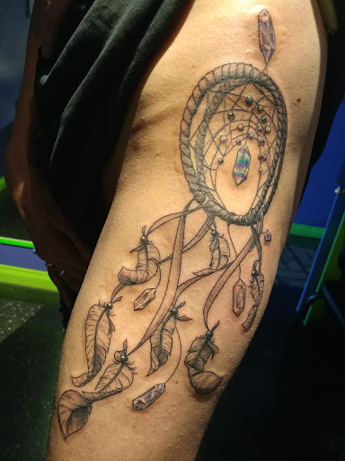 Tattoo Shop «Tit 4 Tat Tattoo Studio Inc.», reviews and photos, 45571 Mound Rd, Shelby Charter Township, MI 48317, USA