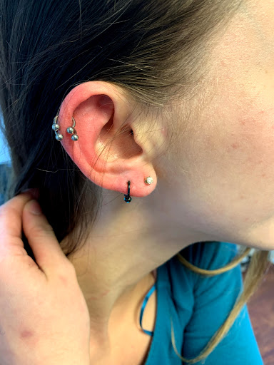 Explore rose name tattoo ideas, creative tattoo ideas in Seymour, available at American Gypsy Tattoo Corp.