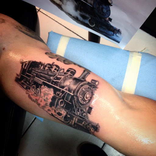 Explore clock tattoo ideas for females, creative tattoo ideas in Kingsford, available at Deft Tattoo Studio