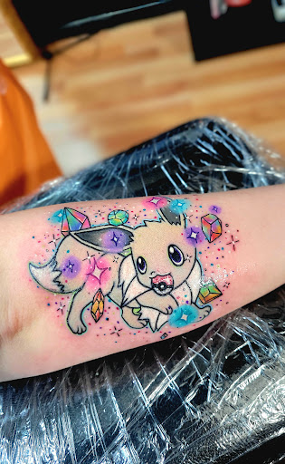 Explore jasmine tattoo ideas, creative tattoo ideas in Benton, available at Spectrum Tattoo