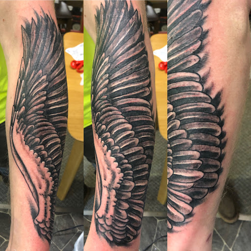 Explore singing tattoo ideas, creative tattoo ideas in Calumet, available at Tattooing by Big Ben