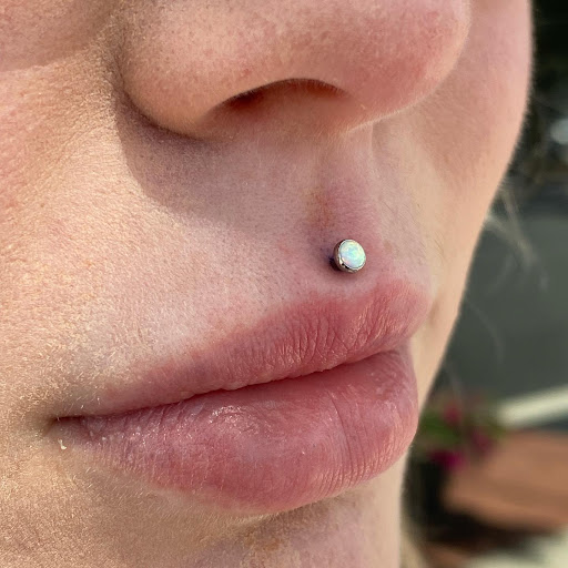 Explore tattoos ideas on back, creative tattoo ideas in Dover, available at Agap Body Piercings